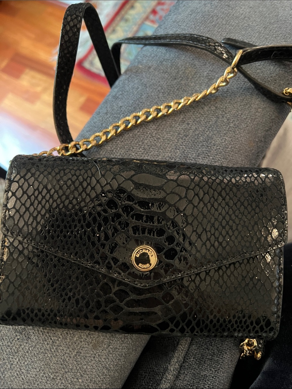Michael Kors Black Snake-Embossed Crossbody Wallet with Gold Chain